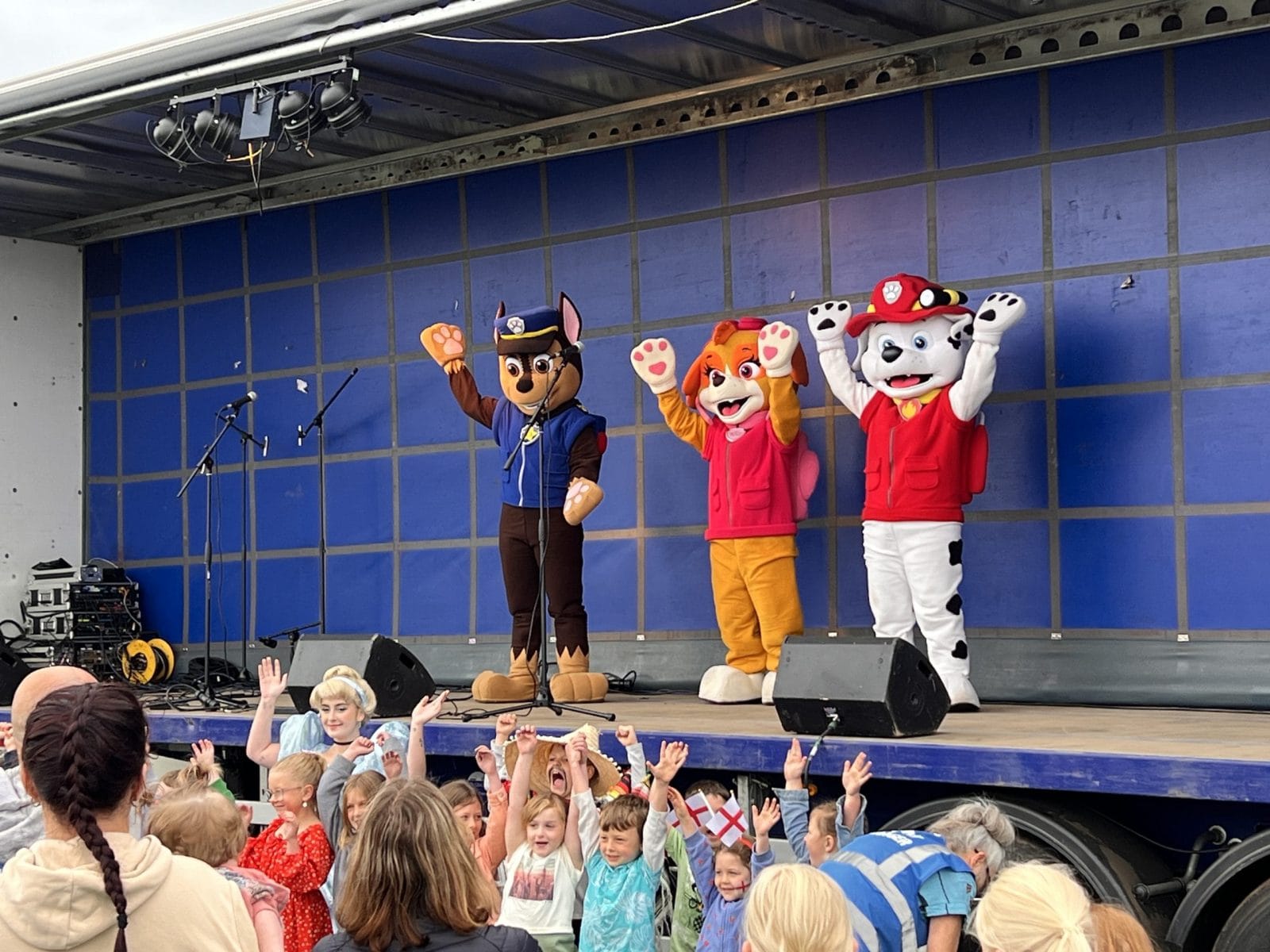 Rescue Pup characters on an outdoor stage
